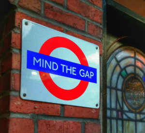 MIND THE GAP sign